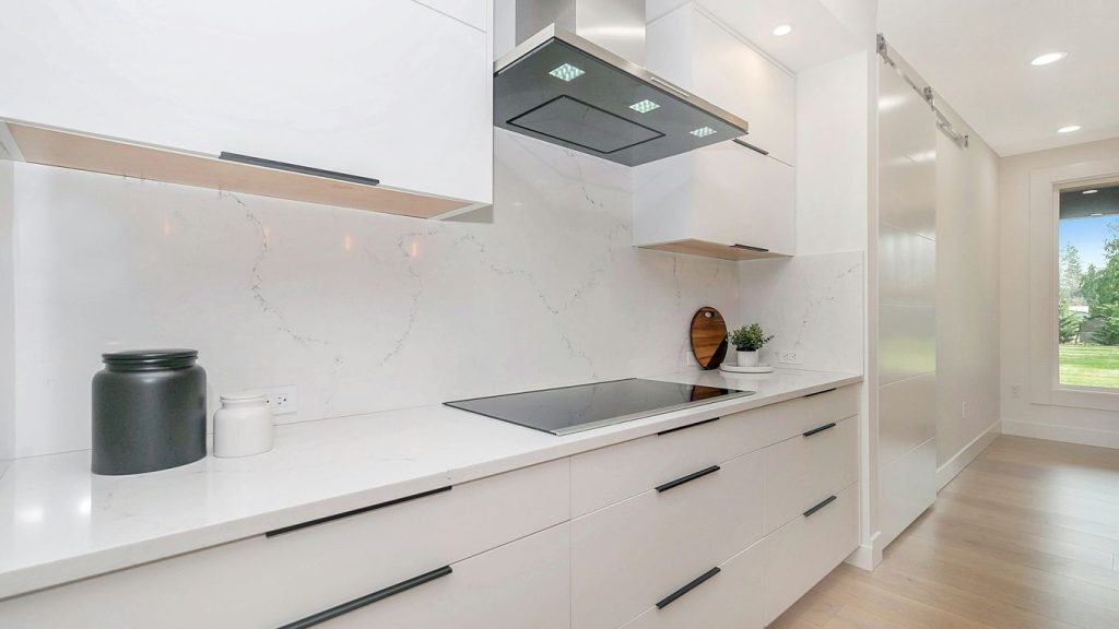 white and black wooden kitchen cabinet