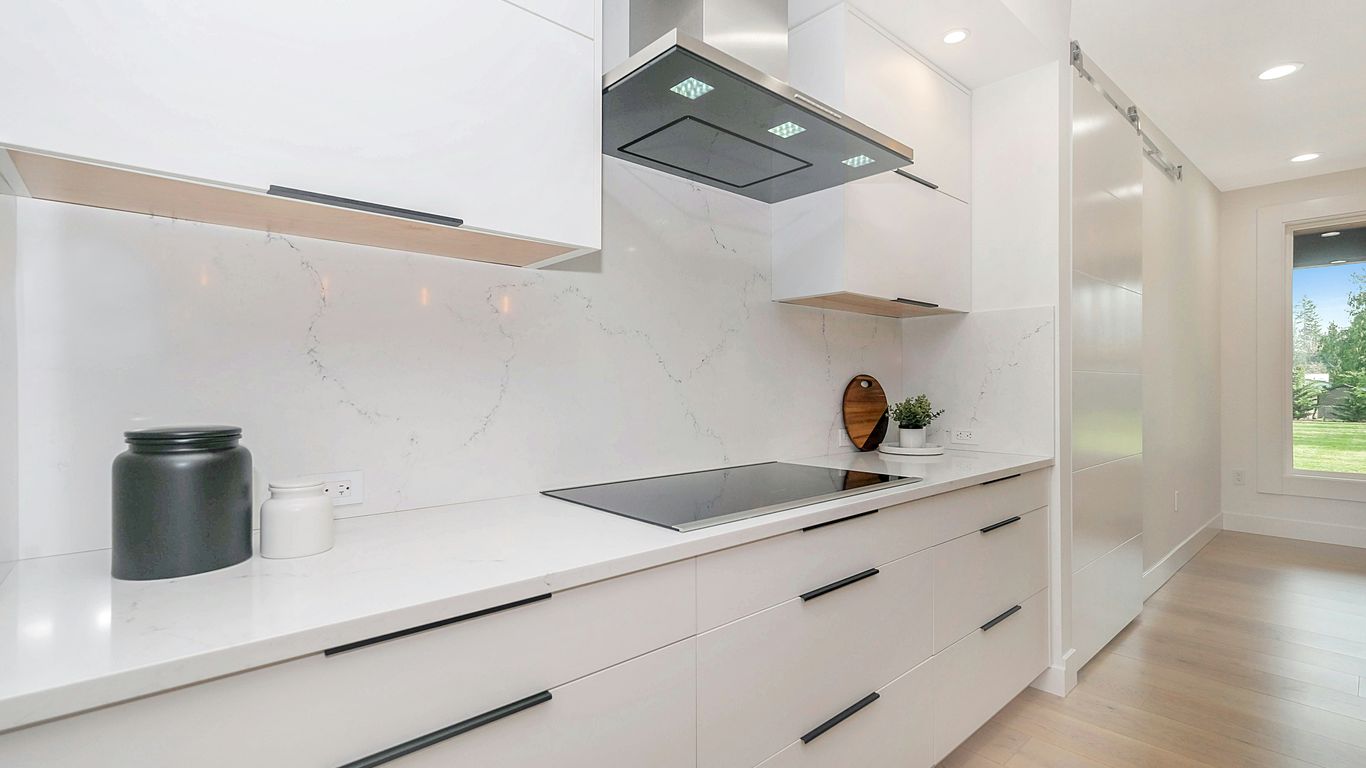 white and black wooden kitchen cabinet