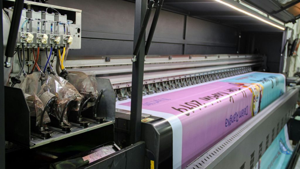 a large machine with a lot of papers on it